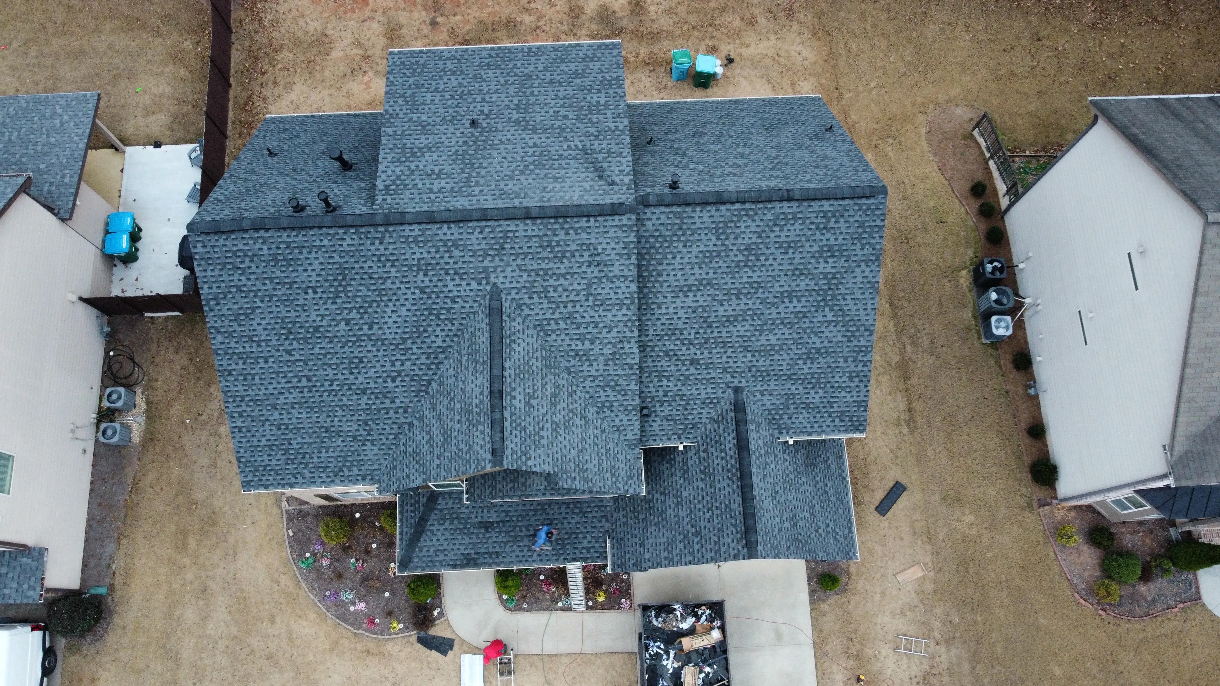 Completed charcoal shingle roof, drone view